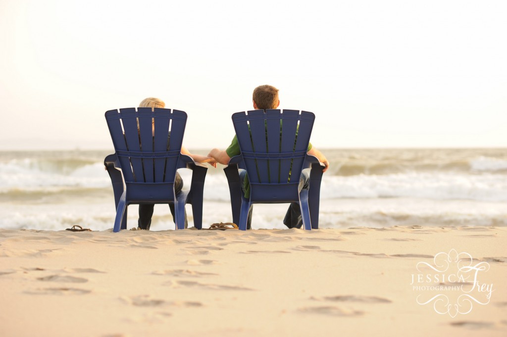 blue adirondack chairs on beach