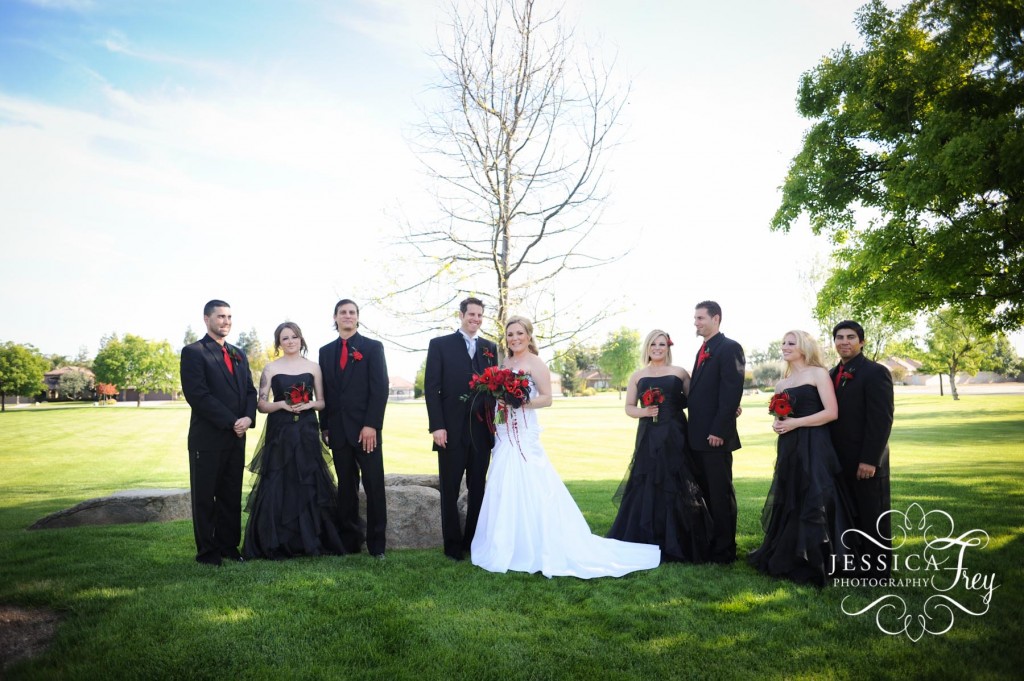 wedding party with black bridesmaid dresses