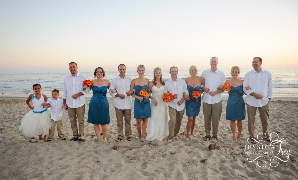 blue bridesmaid dresses, orange bouquet