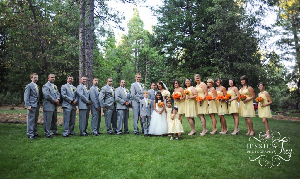 yellow bridesmaid dresses with orange bouquet, grey groomsmen tuxes