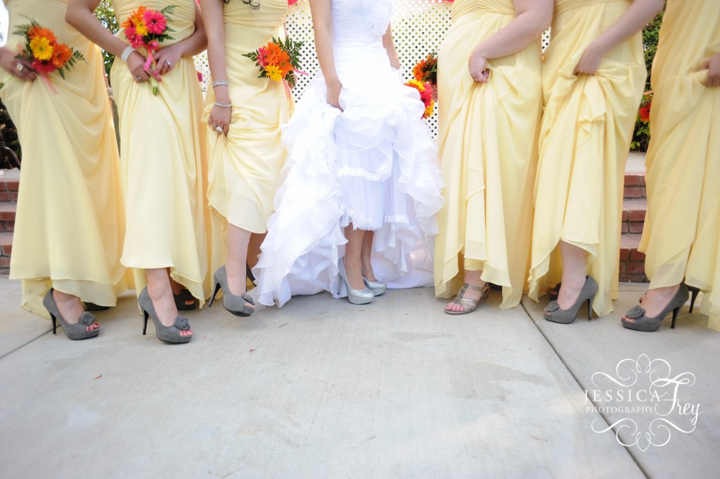 long yellow bridesmaid dress, pink and orange bridesmaid bouquet, grey bridesmaid shoes