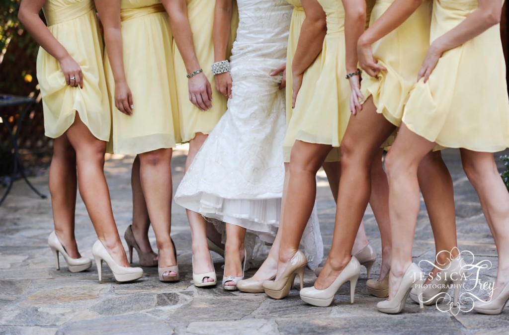 short yellow bridesmaid dress, orange bridesmaid bouquet, tan bridesmaid shoes