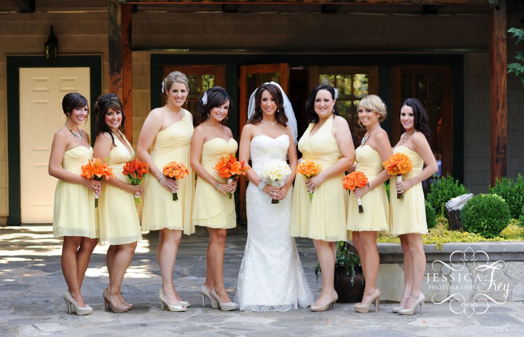 short yellow bridesmaid dress, orange bridesmaid bouquet, tan bridesmaid shoes