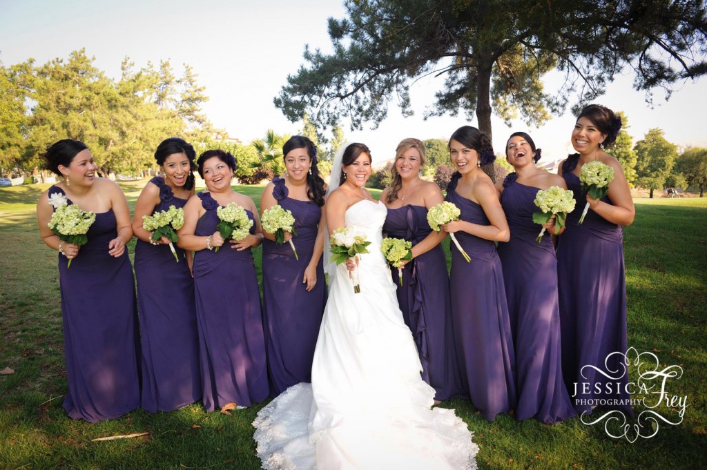 long purple bridesmaid dress, green and champagne bridesmaid bouquet