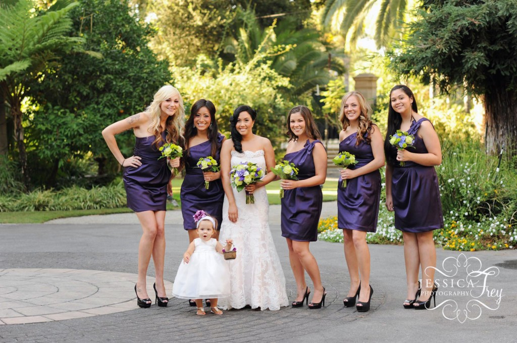 Short purple bridesmaid dresses with green and purple bouquets and black 