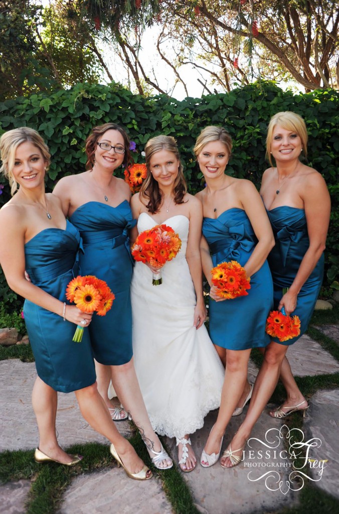 short blue turquoise bridesmaid dress, orange bridesmaid bouquet, orange gerber daisy