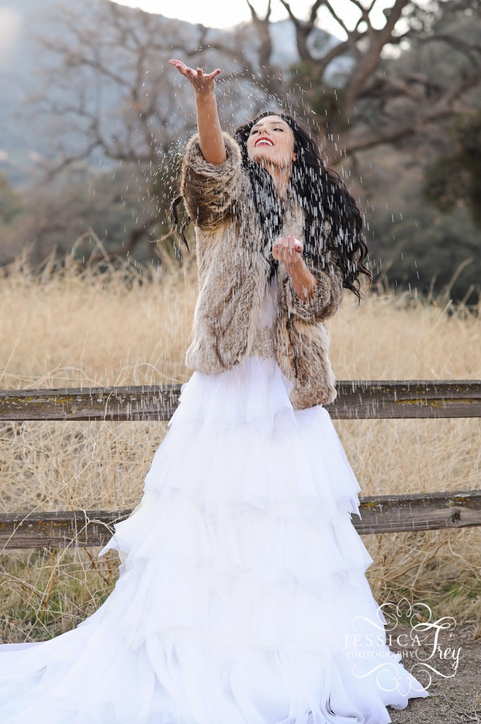 bride in snow and fur coat